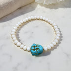 Pulseira Cristal Creme com Buda Azul