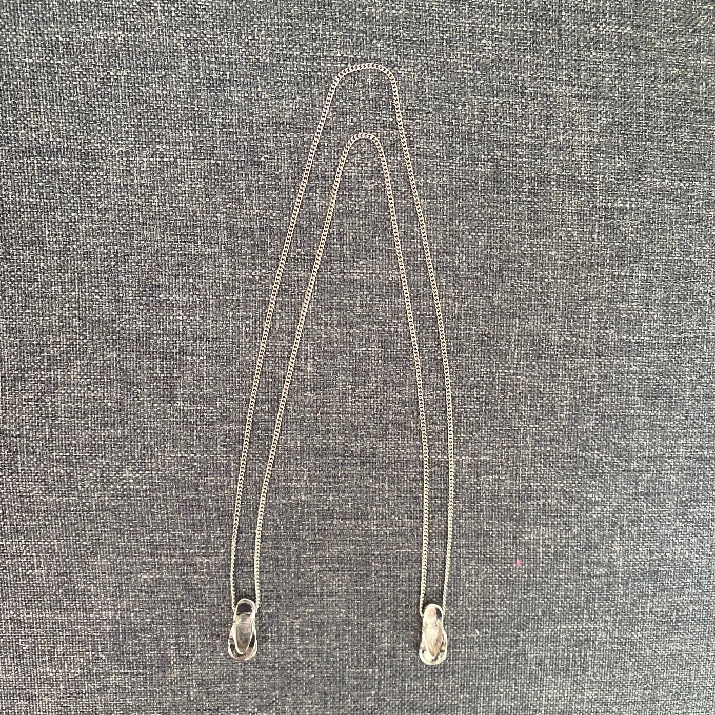 Escapulário Sandálias