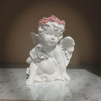 Anjo branco sentado c luz